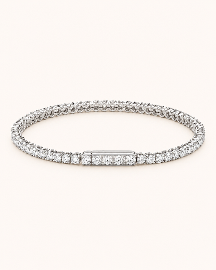 Hidden-lock lab-grown diamond tennis bracelet on soft ivory background