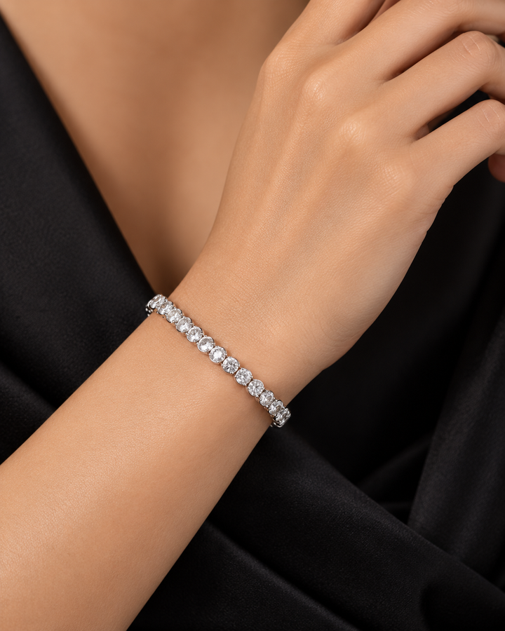 Lab-grown diamond lightweight tennis bracelet in 9ct white gold worn on wrist