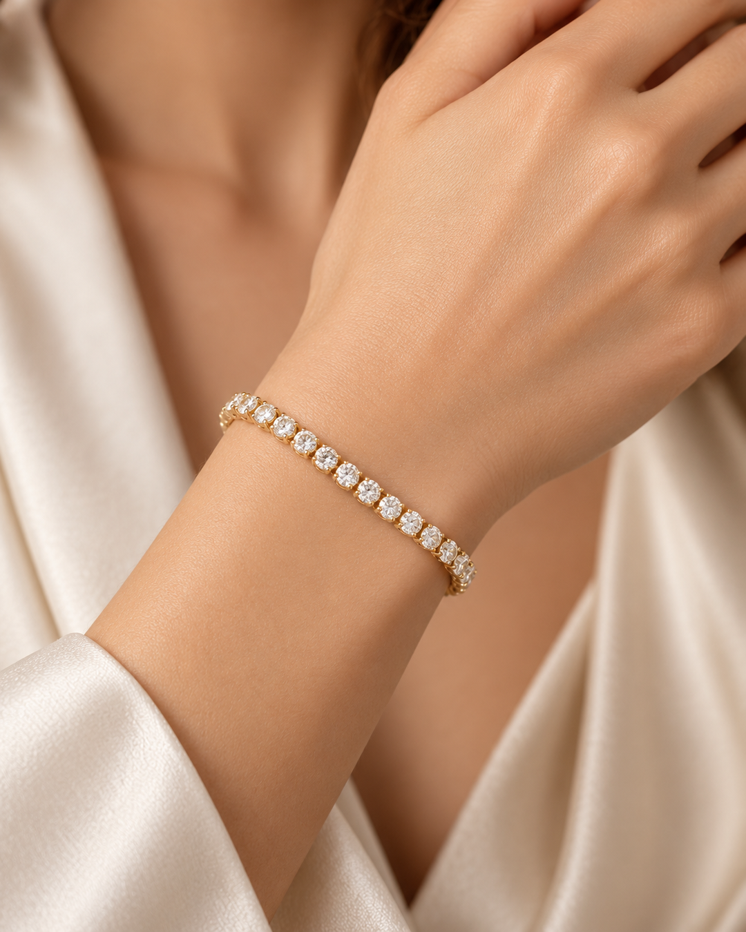 Lab-grown diamond lightweight tennis bracelet in 9ct yellow gold worn on wrist