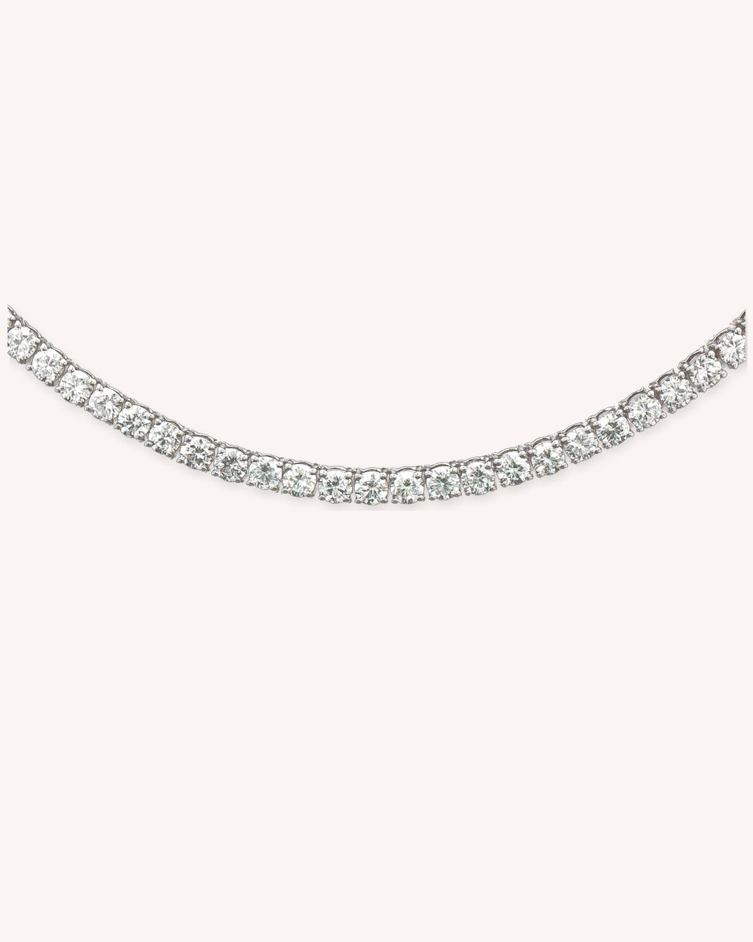 Three-Prong Lab-Grown Diamond Tennis Necklace in 18ct White Gold on cream background #metal_18ct-white-gold