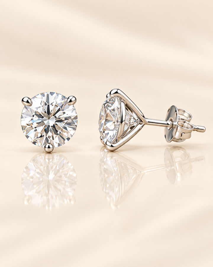 IGI-certified martini lab-grown diamond stud earrings in platinum on cream background #metal_platinum