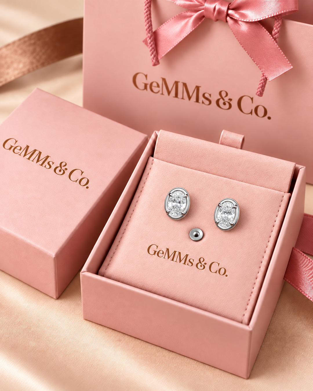 Oval-cut lab-grown diamond studs in 9ct white gold — packaging #metal_9ct-white-gold