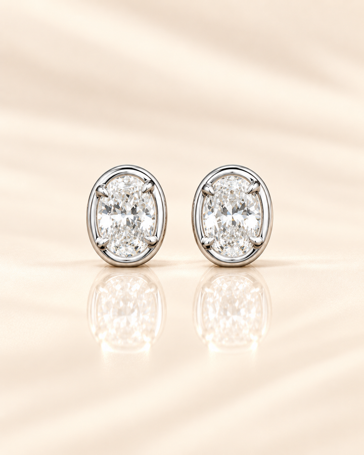 Oval-cut lab-grown diamond studs in 9ct white gold — plain #metal_9ct-white-gold