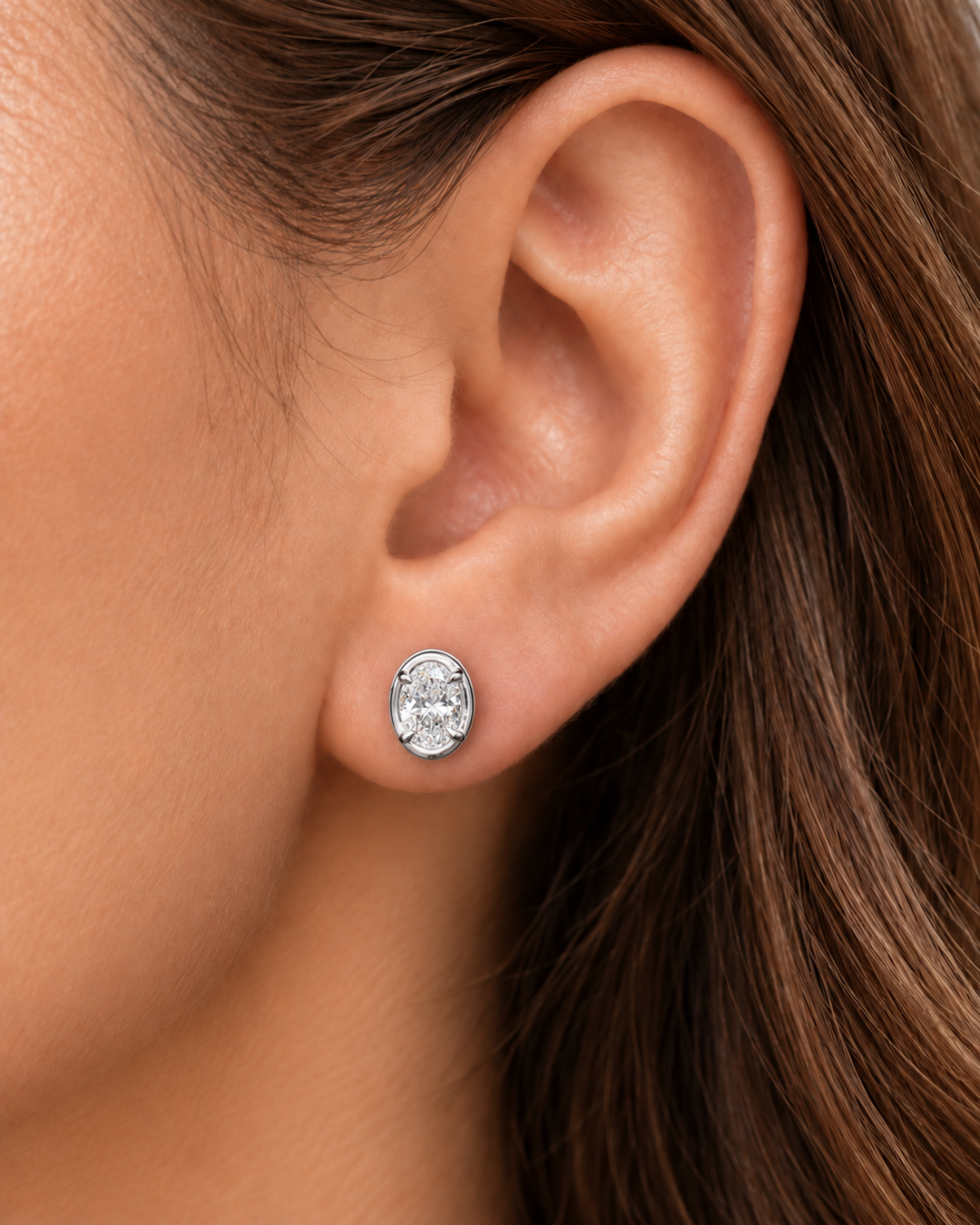 Oval-cut lab-grown diamond studs in 9ct white gold — worn #metal_9ct-white-gold