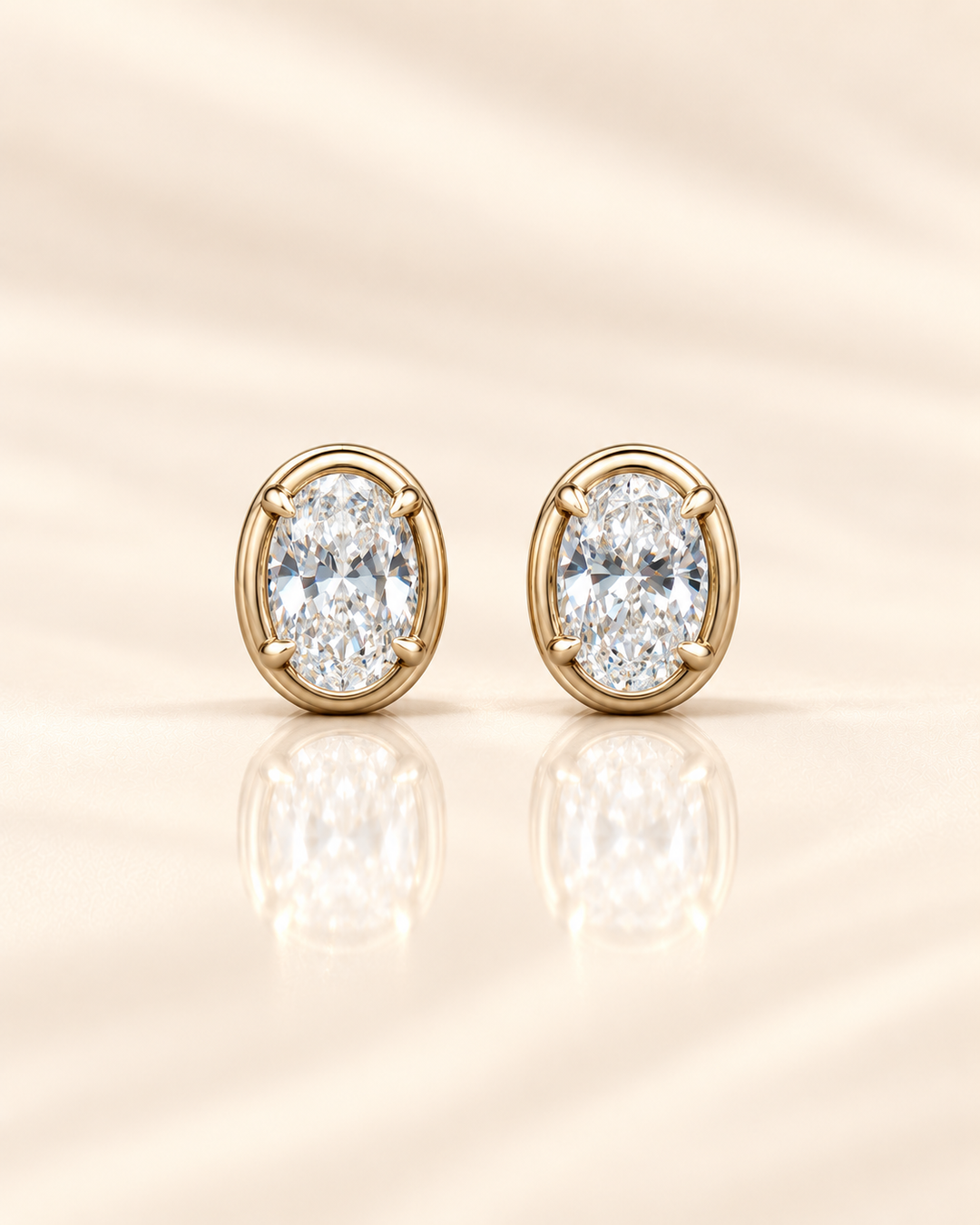 Oval-cut lab-grown diamond studs in 9ct yellow gold — plain #metal_9ct-yellow-gold