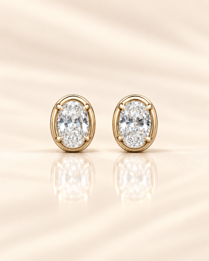 Oval-cut lab-grown diamond studs in 9ct yellow gold — plain #metal_9ct-yellow-gold