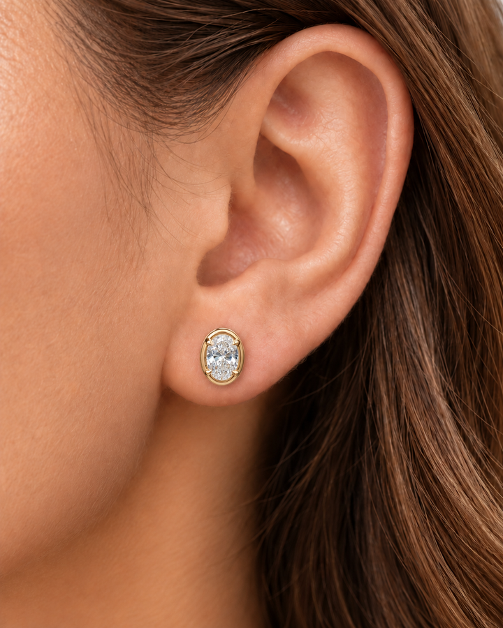 Oval-cut lab-grown diamond studs in 9ct yellow gold — worn #metal_9ct-yellow-gold