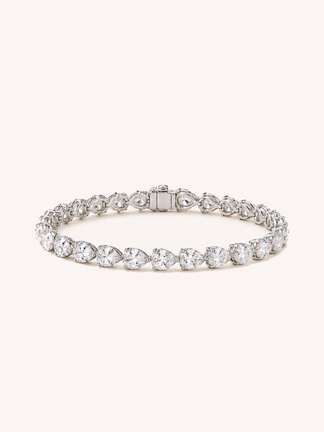 Pear Shape Lab-Grown Diamond Tennis Bracelet on GeMMs & Co. cream background