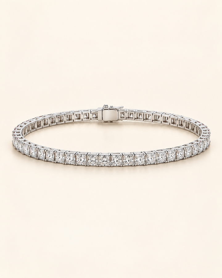 Princess cut lab-grown diamond tennis bracelet on cream background