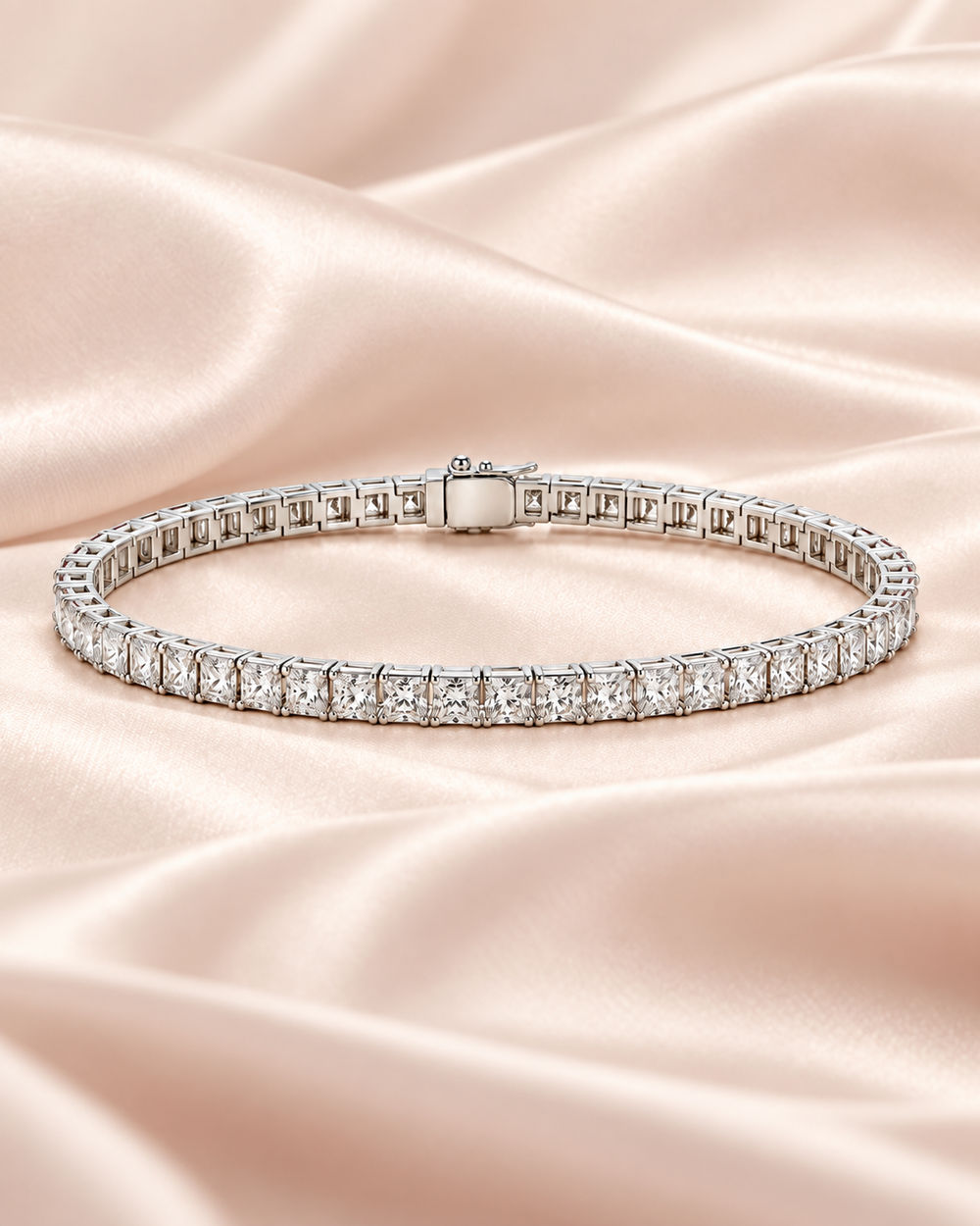 Princess cut lab-grown diamond tennis bracelet on soft blush satin
