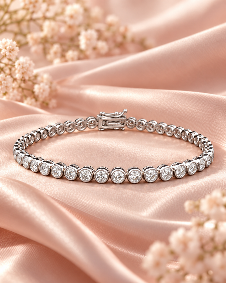 Lab-Grown Diamond Rub Over Tennis Bracelet styled on blush satin