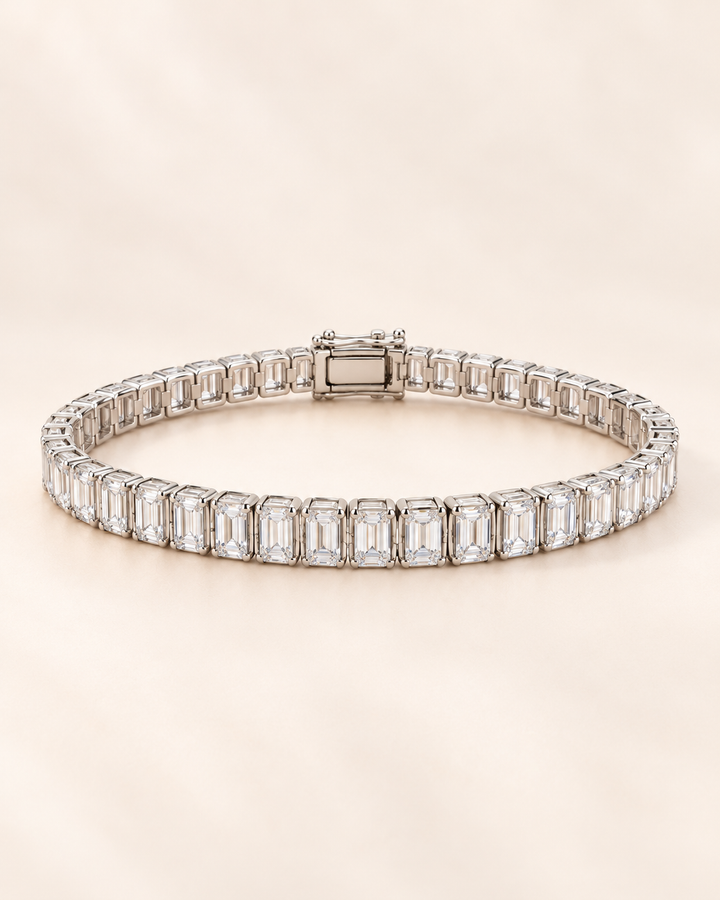 Semi Rub Over Baguette lab-grown diamond tennis bracelet on cream background