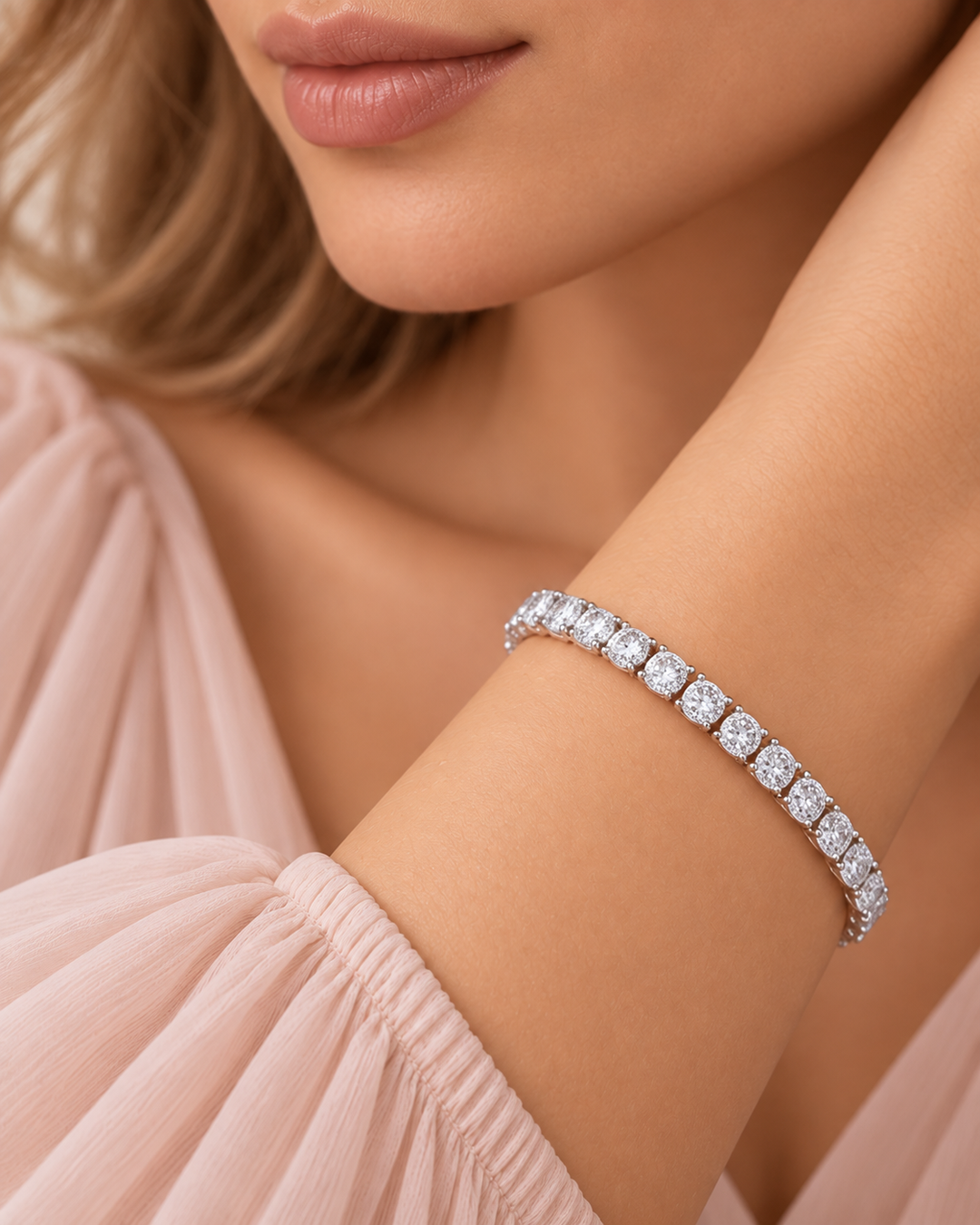 Side-lock tennis bracelet worn by elegant model, lips and chin only, portrait