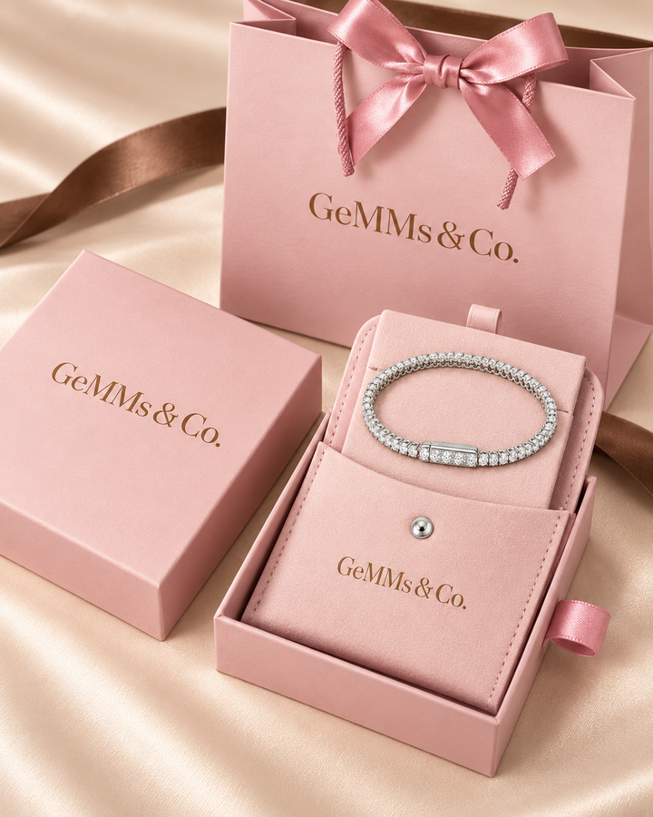 Side-lock tennis bracelet in GeMMs & Co. pink luxury packaging with pouch