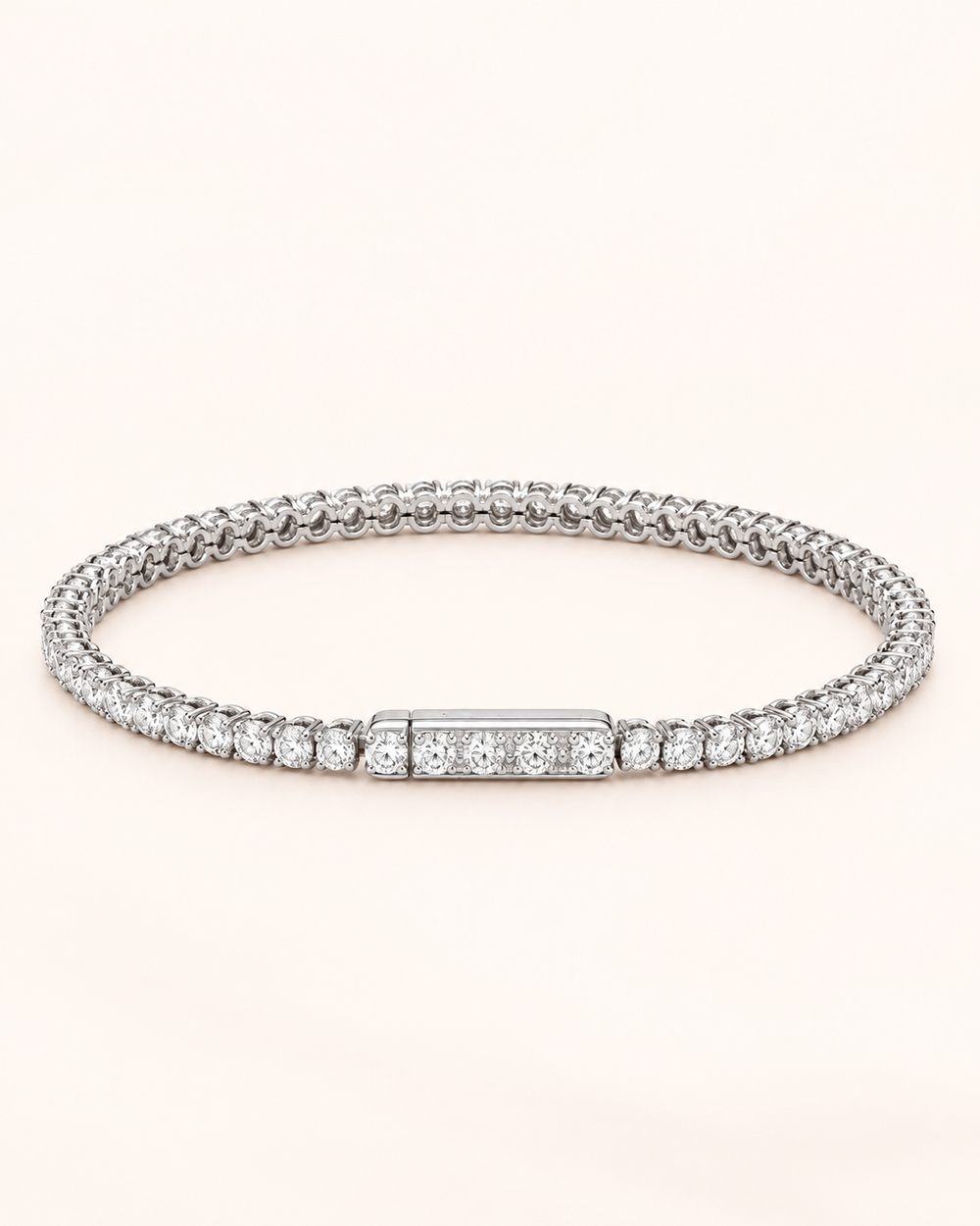 Side-lock lab-grown diamond tennis bracelet on soft ivory background