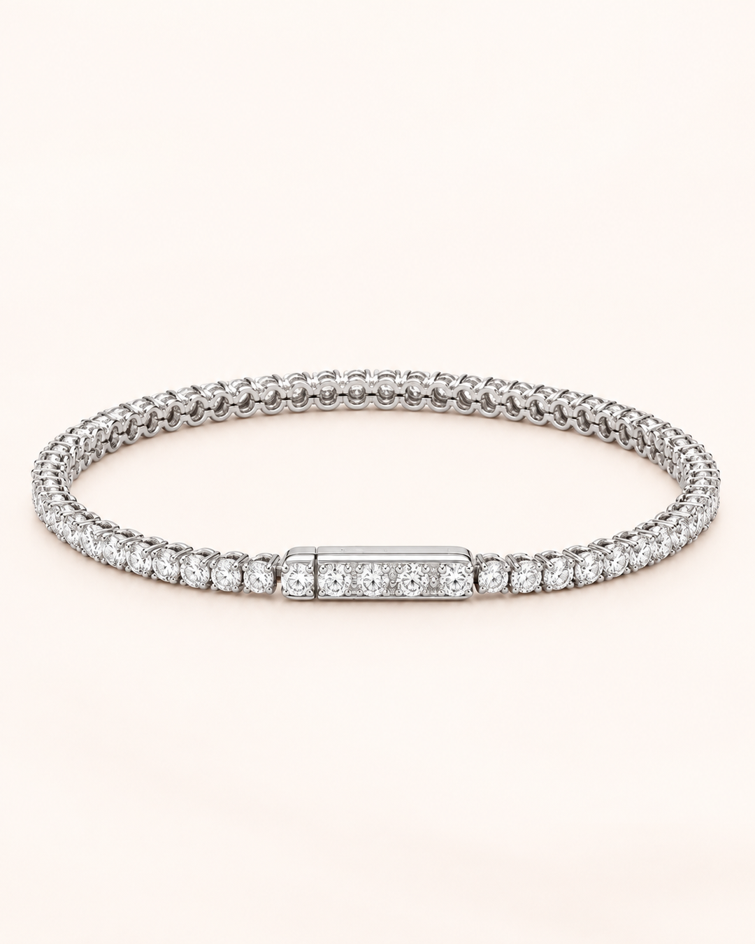 Side-lock lab-grown diamond tennis bracelet on soft ivory background