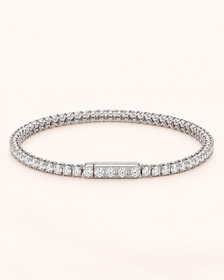 Side-lock lab-grown diamond tennis bracelet on soft ivory background