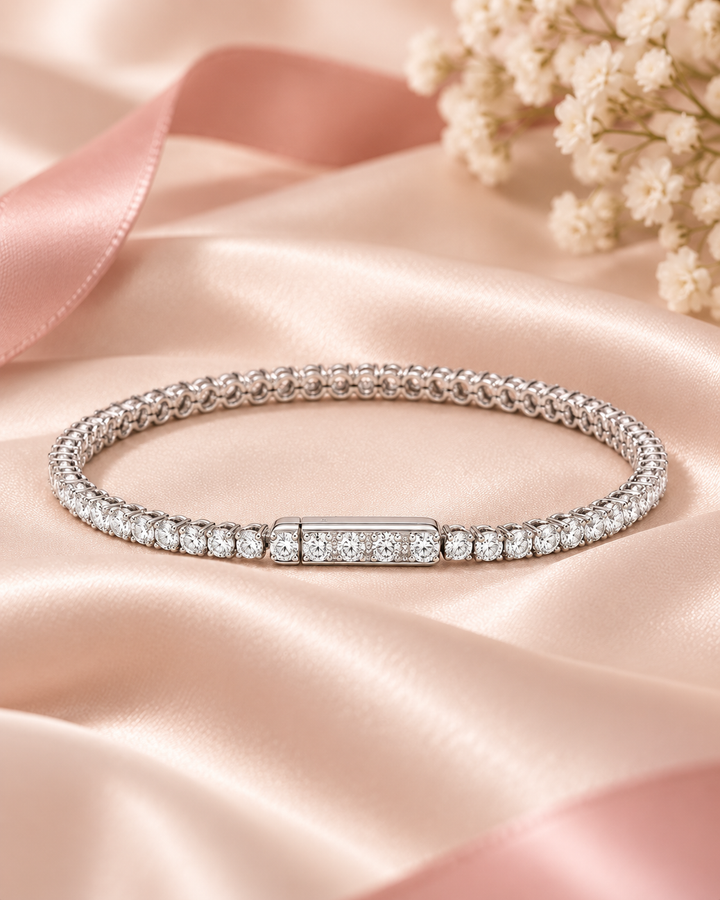 Side-lock lab-grown diamond tennis bracelet on soft blush satin