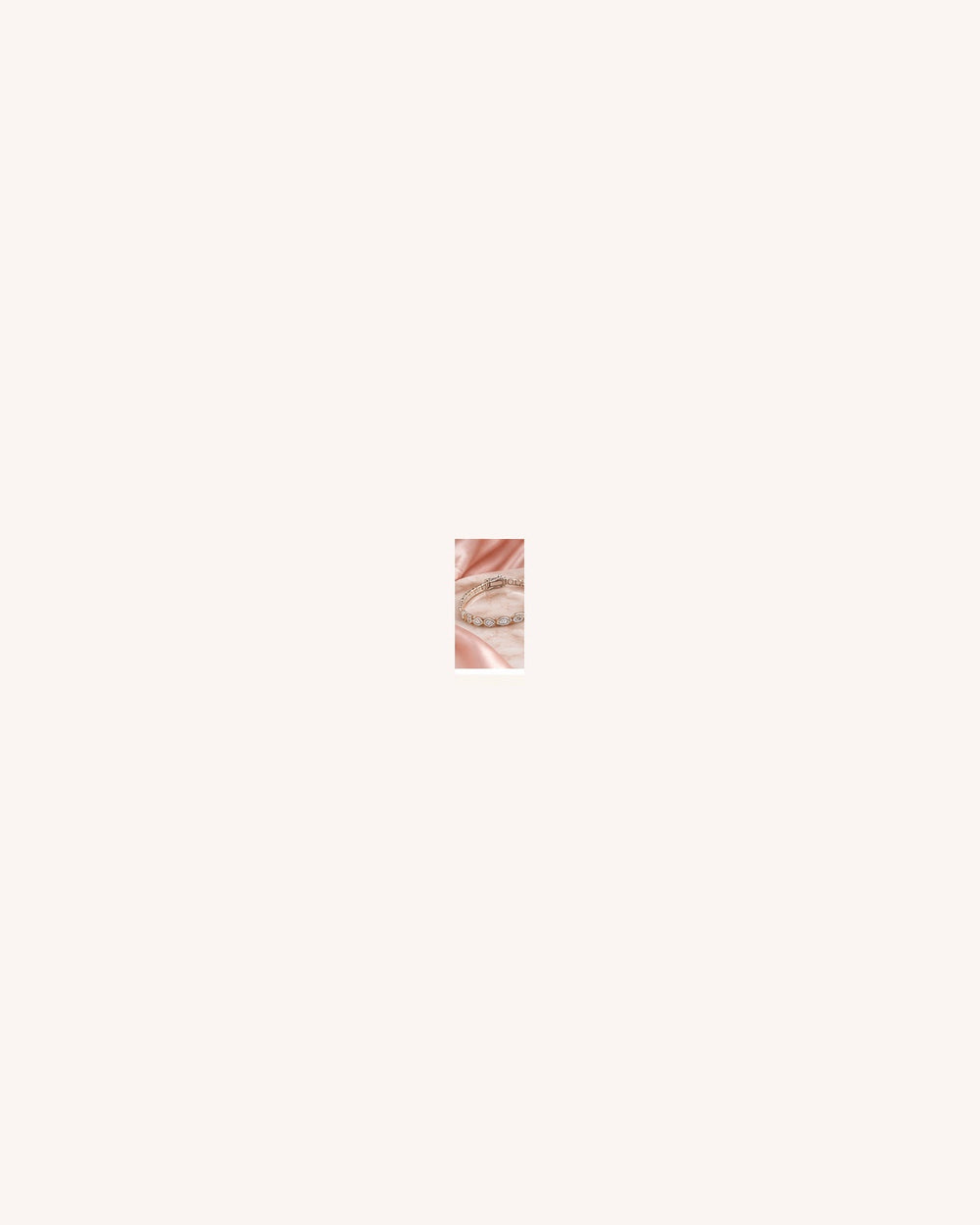 Lab-grown diamond three-prong tennis bracelet styled in GeMMs & Co. blush tones