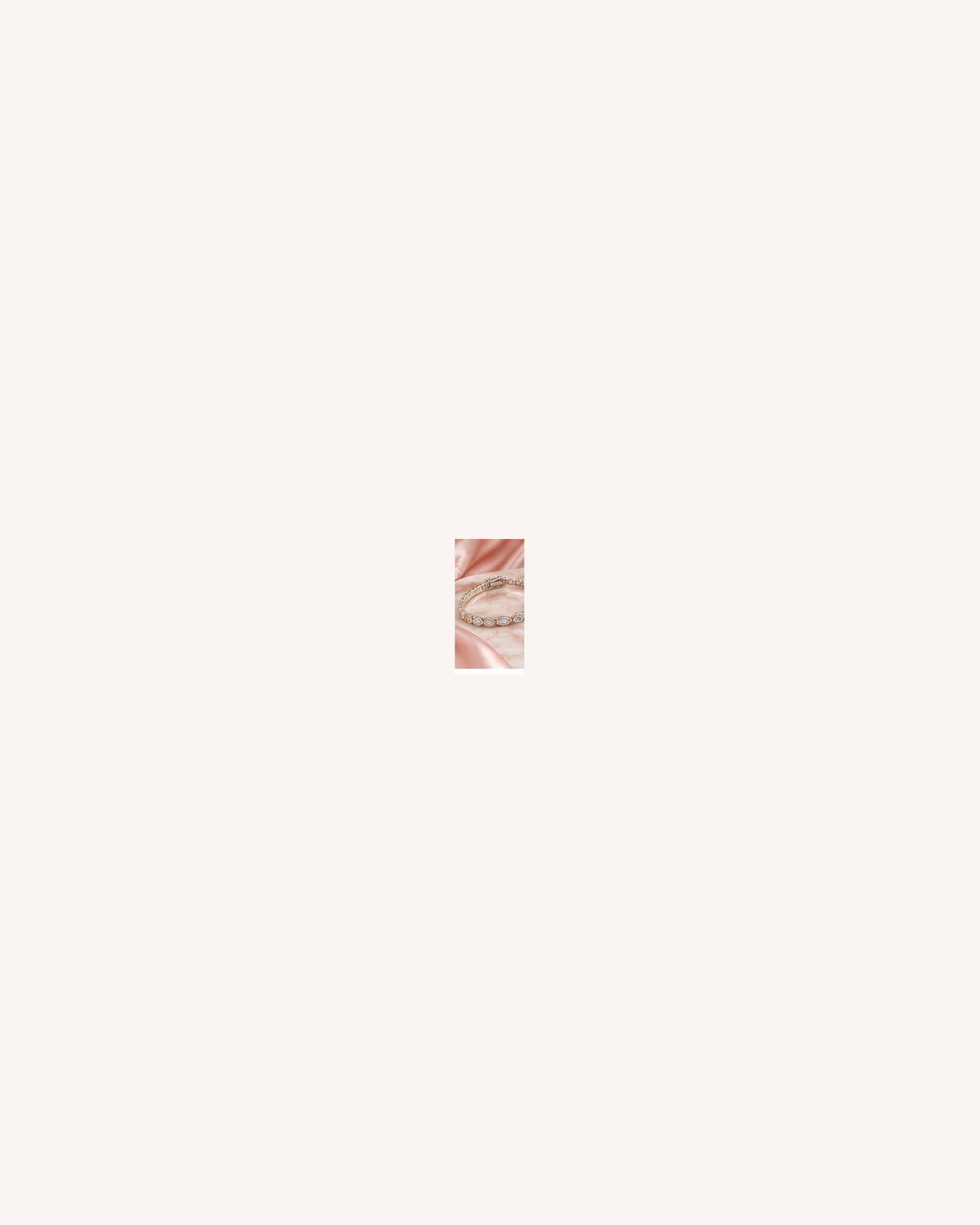 Lab-grown diamond three-prong tennis bracelet styled in GeMMs & Co. blush tones