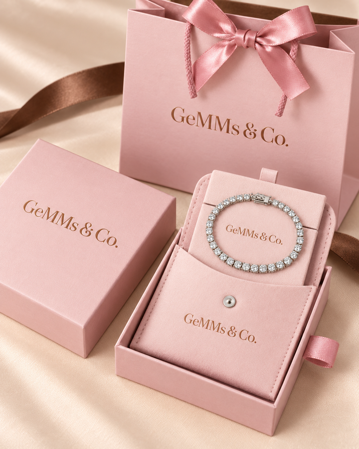 Under-lock tennis bracelet in GeMMs & Co. pink luxury packaging with pouch